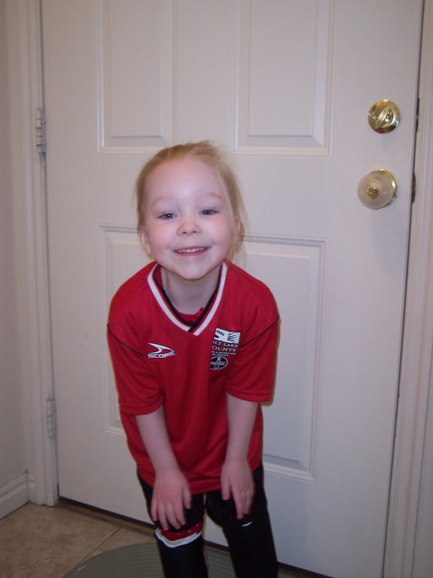 Emma in her soccer uniform