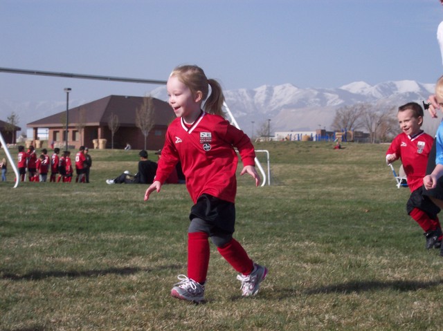 Emma in her first soccer game