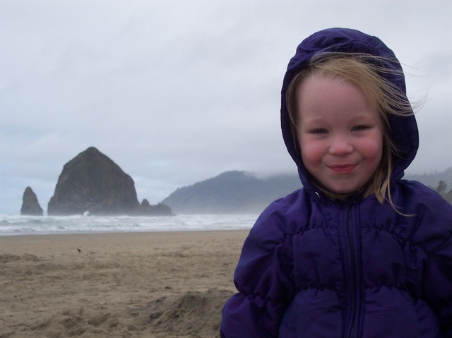 Emma on the Tolovana Park beach with the Rock in the background