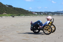 Sarah fun-cycling on Manzanita Beach