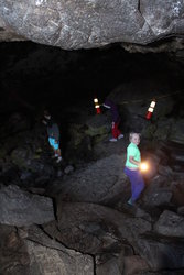 Mike, Emma, and Sarah in Dewdrop Cave at Craters of the Moon