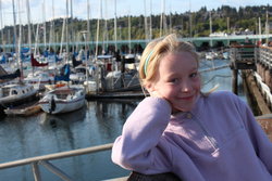Emma in front of the Des Moines WA marina