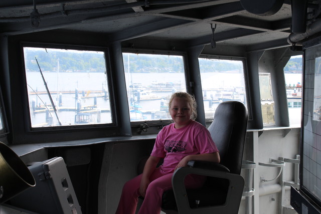 Sarah on bridge of USS Turner Joy