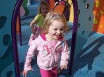 Sarah running through Elmo's playground at Sea World