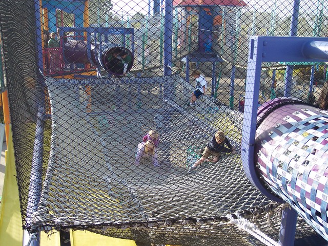 Emma and Sarah climbing through nets at Sea World