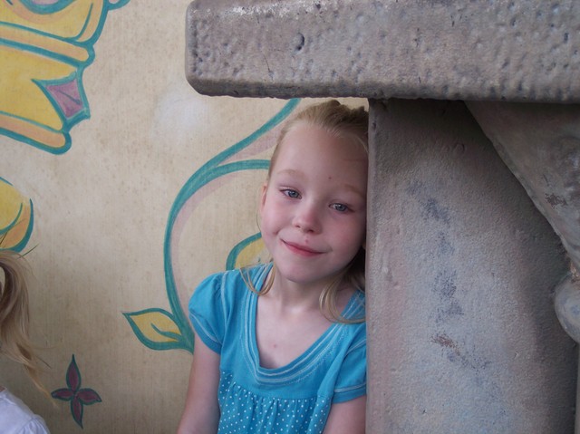 Emma waiting to meet the princesses at Disneyland