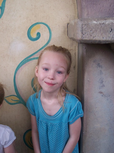 Emma waiting to meet the princesses at Disneyland