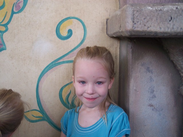 Emma waiting to meet the princesses at Disneyland