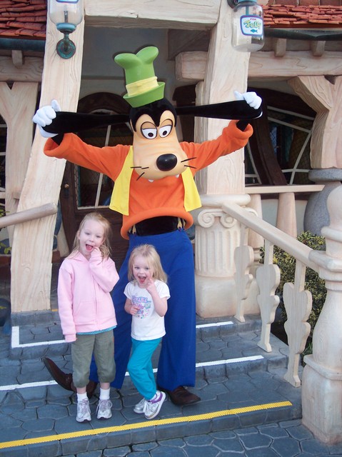 Sarah and Emma with Goofy at Disneyland