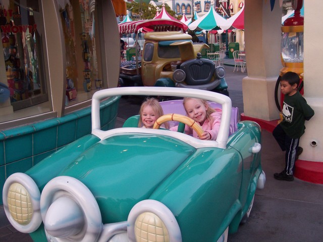 Sarah and Emma in a car in Toon Town at Disneyland
