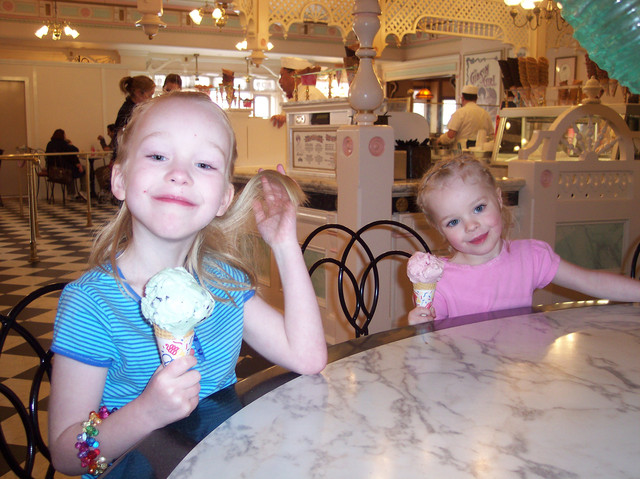 Emma and Sarah enjoying an ice cream cone in the Gibson Girl Ice Cream Parlor at Disneyland