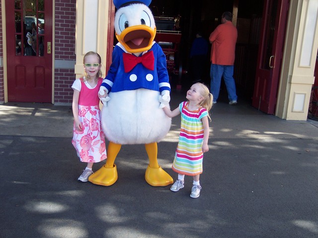 Sarah and Emma with Donald Duck at Disneyland
