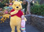 Sarah with Pooh Bear at Disneyland