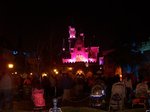 Night-time view of the castle at Disneyland