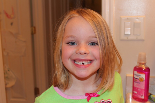 Sarah's first tooth gone!