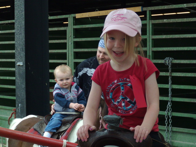 Emma riding pony at County Fair