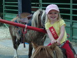 Sarah riding pony at County Fair