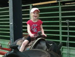 Emma riding pony at County Fair