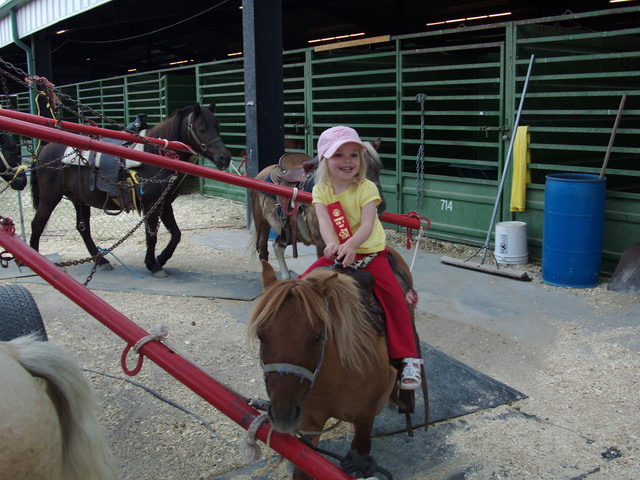 Sarah riding pony at County Fair