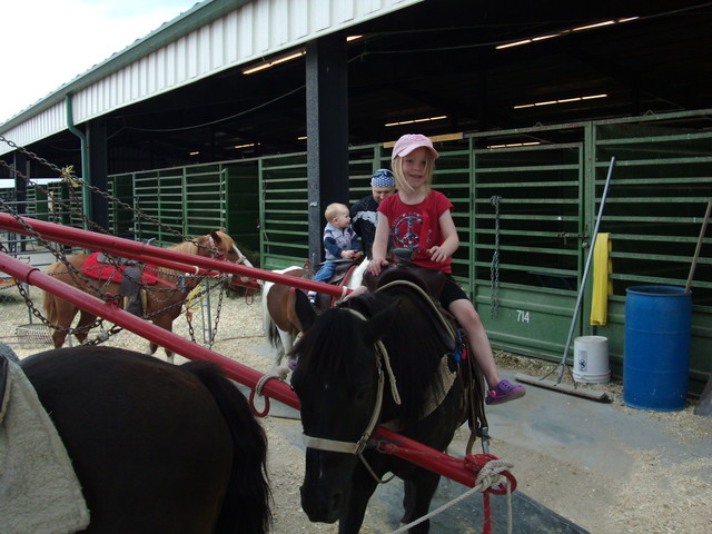 Emma riding pony at County Fair