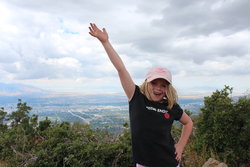 Sarah on top of Grandeur Peak
