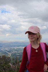 Emma on top of Grandeur Peak