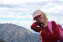 Emma on top of Grandeur Peak