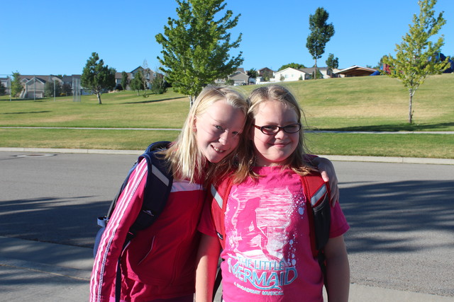 Emma and Sarah, first day of 6th and 4th grade