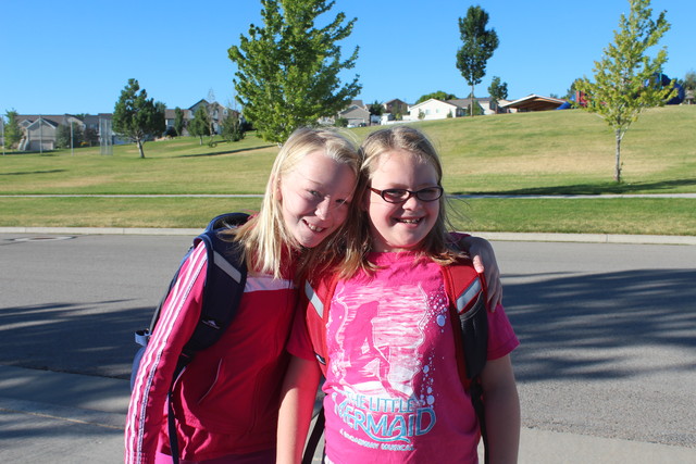 Emma and Sarah, first day of 6th and 4th grade