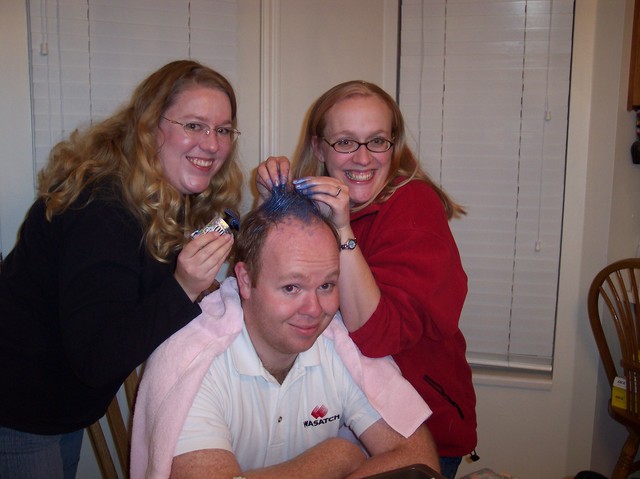 Amelia and Camille having fun with Steve's hair