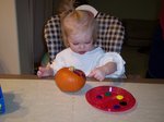 Sarah painting pumpkins