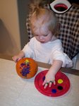 Sarah painting pumpkins