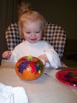Sarah painting pumpkins