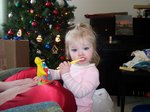 Sarah on Christmas morning - her favorite toy that year :)