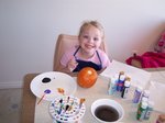 Sarah Painting Her Pumpkin