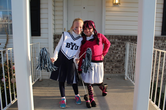 Emma as a BYU Cheerleader and Sarah as Draculaura from Monster High on Halloween